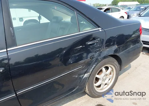 2003 Toyota Camry Xle z USA, uszkodzony, nr VIN 4T1BE30KX3U197331